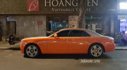Rolls-Royce Ghost Series II màu cam rực rỡ dạo phố đêm Sài Gòn
